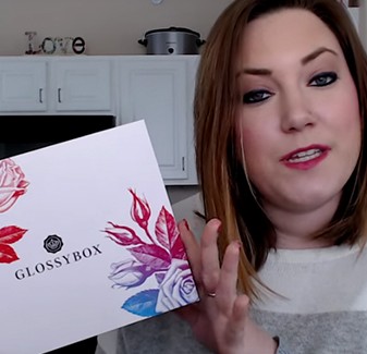 Emily from Rocky Mountain Savings holding the Glossybox Mother's Day Box.